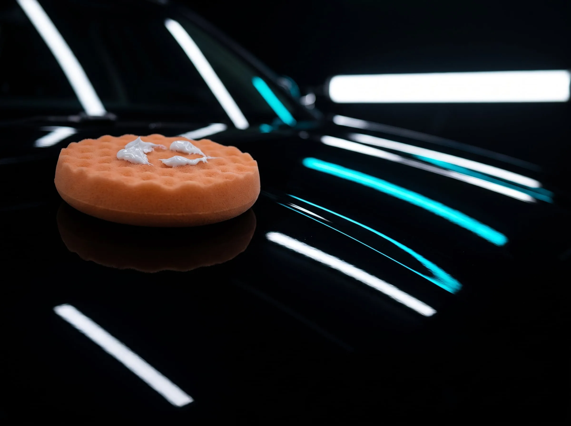 Polishing pad and compound on gloss black paint